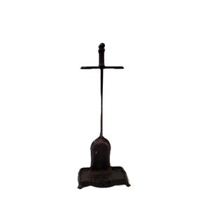 May include: A dark brown, cast iron fireplace tool set. The set includes a stand with a crossbar, a long handle, and a base. The stand is approximately 30 inches tall.