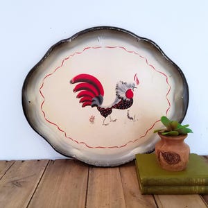 May include: A set of three ceramic nesting bowls in shades of blue, green, and white. The bowls feature a speckled glaze and a simple, modern design. The largest bowl measures approximately 8 inches in diameter.