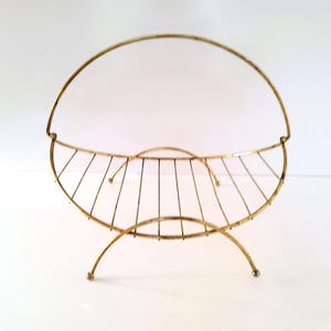 Mid century modern magazine rack, brass magazine rack, atomic magazine holder, gold magazine holder, metal, 1950&#39;s