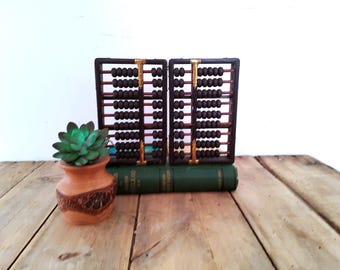 Pair of vintage abacus bookends, unique, chinoiserie, brass, black and gold