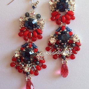 May include: Berry earrings with red, blue, and silver beads. The earrings are made with a variety of beads, including crystal, seed beads, and pearls. The earrings are a statement piece and would be perfect for a special occasion.