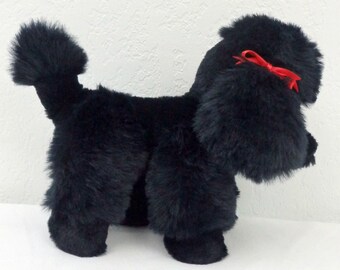 black toy poodle stuffed animal