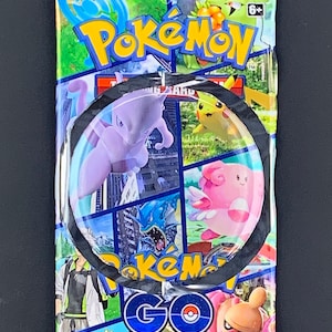 PKMN GO Pack Wrapper Buttons/Pins (2.25&quot;)