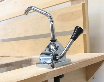 mud kitchen with water pump