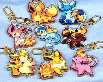 Eeveelution with Baby Eevee 2” acrylic keychain