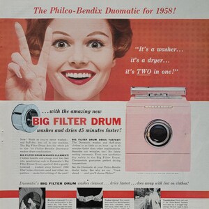 May include: Vintage advertisement for the Philco-Bendix Duomatic washer-dryer from 1958. The ad features a smiling woman giving a peace sign, a pink washing machine, and text promoting the appliance's features.