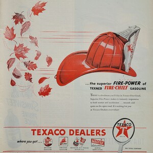 May include: A vintage advertisement for Texaco Fire-Chief petrol. The ad features a red fire helmet with a star on the side, blowing away red autumn leaves. The text reads "Brisk as an Autumn breeze... the superior FIRE-POWER of TEXACO FIRE-CHIEF GASOLINE".