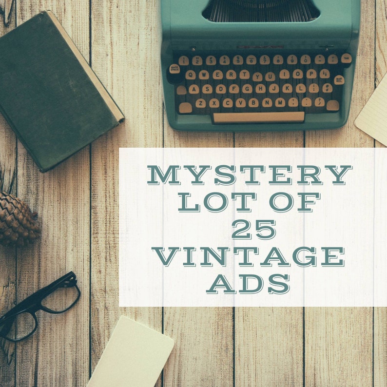 May include: A vintage typewriter with a blue body and a white keyboard sits on a wooden surface. A white card with the text "MYSTERY LOT OF 25 VINTAGE ADS" is in front of the typewriter.