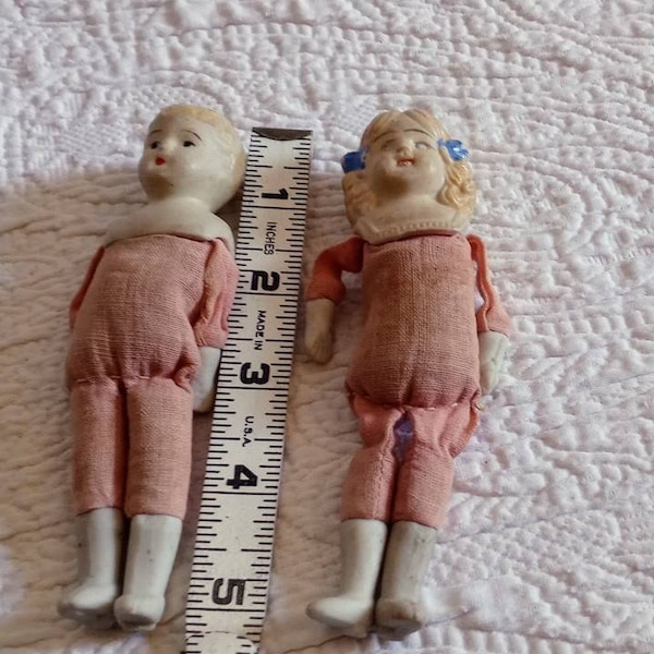 Antique Bisque Porcelain dolls with cloth body