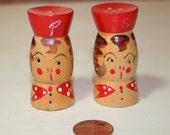 Tiny wooden vintage Japan made salt and pepper shaker set 2 inch tall hand painted girl with red hat