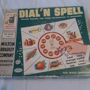 Dial n spell 1959 Milton Bradley game learning spelling teaching words visual  vintage 50s fun memory game