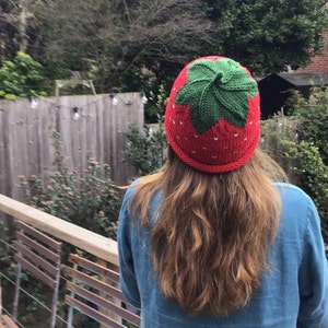 The adult size strawberry hat can be made in red or navy.Its hand knitted.