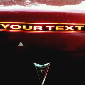 2005 to 2009 G6 3rd brake light decal overlay Fits pontiac G6 shaped as your light, you choose your custom saying