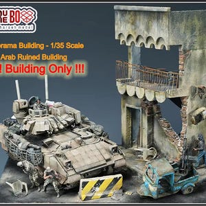 May include: A detailed diorama depicting a war scene with a tan tank, a dilapidated building, and miniature figures. The building shows signs of damage with exposed brickwork and a balcony. Text reads "Diorama Building - 1/35 Scale Arab Ruined Building !!! Building Only !!!".