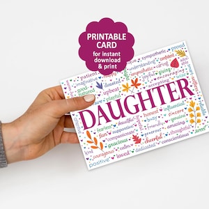 May include: A rectangular greeting card featuring the word DAUGHTER in large purple letters, surrounded by a word cloud of positive adjectives in various colors, small heart icons, and leaf illustrations, with a purple badge stating PRINTABLE CARD.