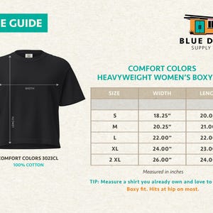 May include: A black boxy t-shirt with a size guide chart. The chart lists sizes S through 2XL with corresponding width and length measurements in inches. Text includes Comfort Colors Heavyweight Boxy Tee, 100% Cotton, and Blue Door Supply Co.