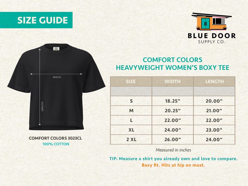 May include: A black boxy t-shirt with a size guide chart. The chart lists sizes S through 2XL with corresponding width and length measurements in inches. Text includes Comfort Colors Heavyweight Boxy Tee, 100% Cotton, and Blue Door Supply Co.