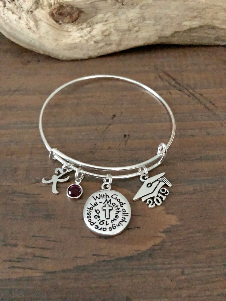 Cross Charm On A 8 1//2 Inch Round Double Loop Bangle Bracelet