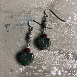 Green leaf and garnet Czech glass bead earrings