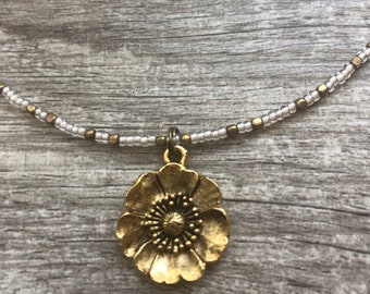 Bronze flower pendant with seed bead chain