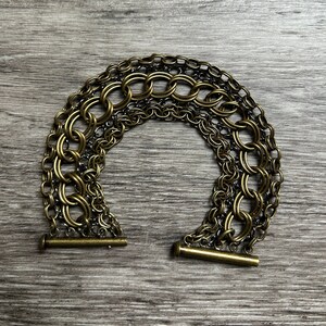 Mixed metal 5 strand chain bracelet