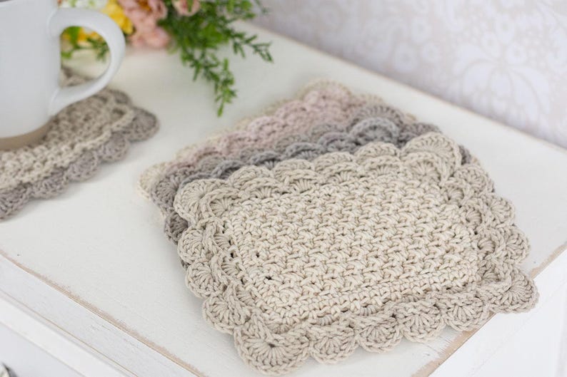 Crochet scalloped mug rug stack.