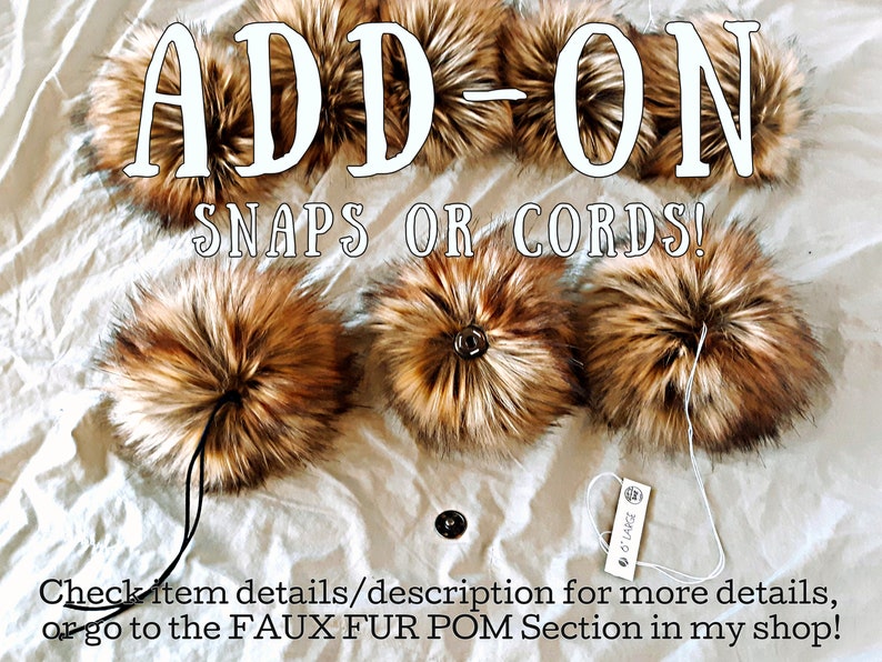 Puede incluir: Pompones de piel sint&eacute;tica en tonos marr&oacute;n y beige, con el texto "ADD-ON SNAPS OR CORDS!". La imagen muestra varios pompones con cordones y broches. Una etiqueta dice "6" LARGE".