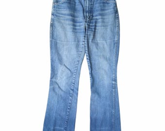 Pantalones vaqueros Wrangler vintage de los años 80, corte bota, fabricados en EE. UU., con efecto desgastado, talla 27 de cintura para mujer.