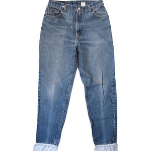 Y2K 550 Levi&#39;s Vintage Levi&#39;s Relaxed Fit Tapered leg White Eyelet Trim Size 12