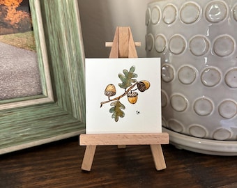 Aquarell Miniatur Eichel mit Staffelei: Herbst Dekor