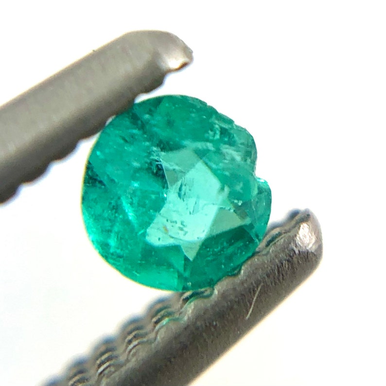 Paraiba tourmaline melee 0.08 carats 2.61x1.54mm round cut loose gemstone Buy loose or customise image 2