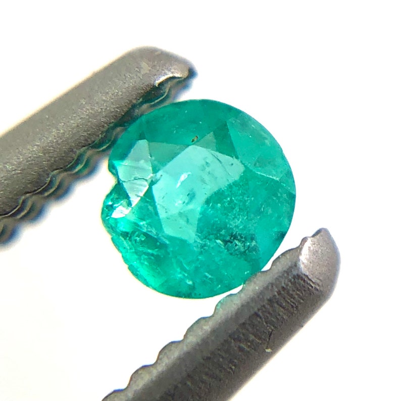 Paraiba tourmaline melee 0.08 carats 2.61x1.54mm round cut loose gemstone Buy loose or customise image 7