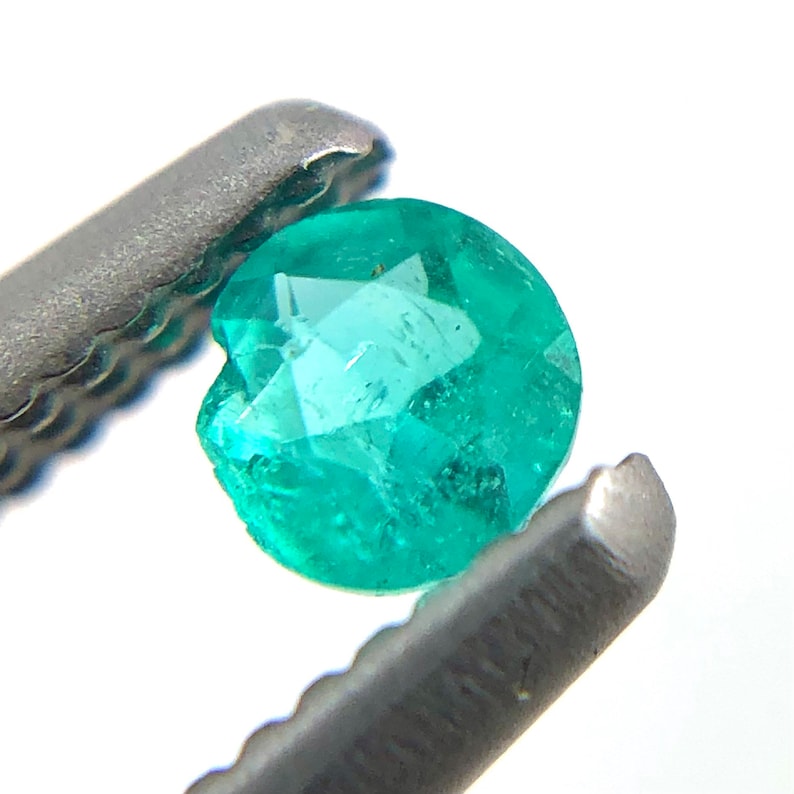 Paraiba tourmaline melee 0.08 carats 2.61x1.54mm round cut loose gemstone Buy loose or customise image 5