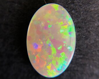 Australian black opal 0.60 carat loose gemstone - Buy loose or make a custom order