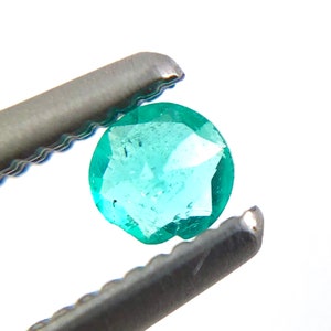 Paraiba tourmaline melee 0.08 carats 2.61x1.54mm round cut loose gemstone Buy loose or customise image 8