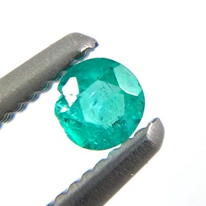 Paraiba tourmaline melee 0.08 carats 2.61x1.54mm round cut loose gemstone Buy loose or customise image 6