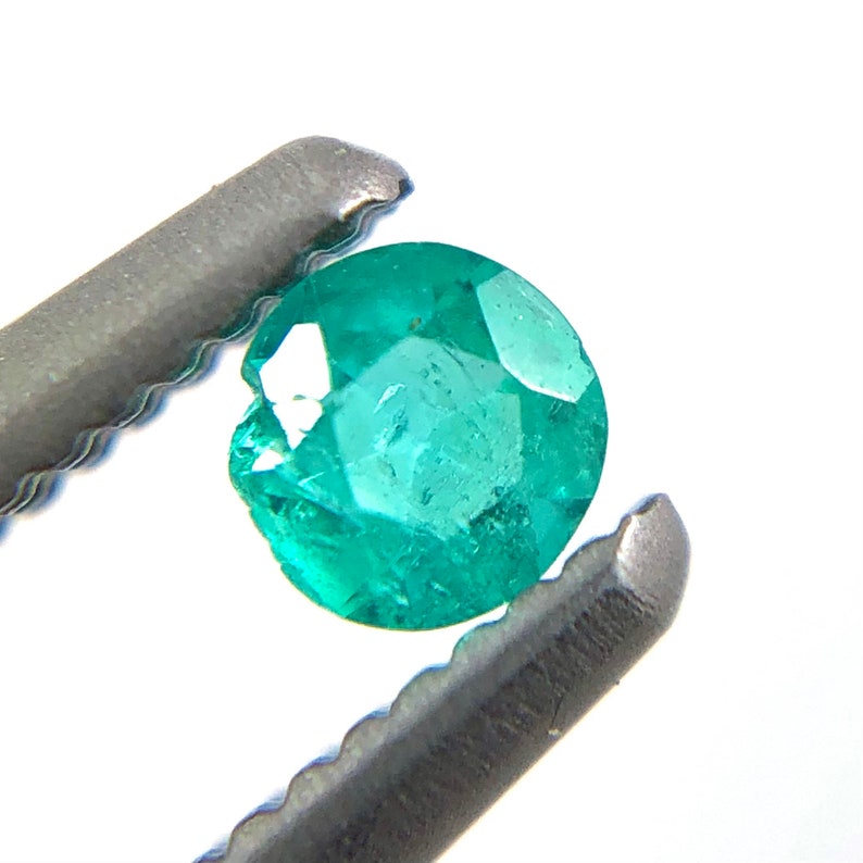 Paraiba tourmaline melee 0.08 carats 2.61x1.54mm round cut loose gemstone Buy loose or customise image 6