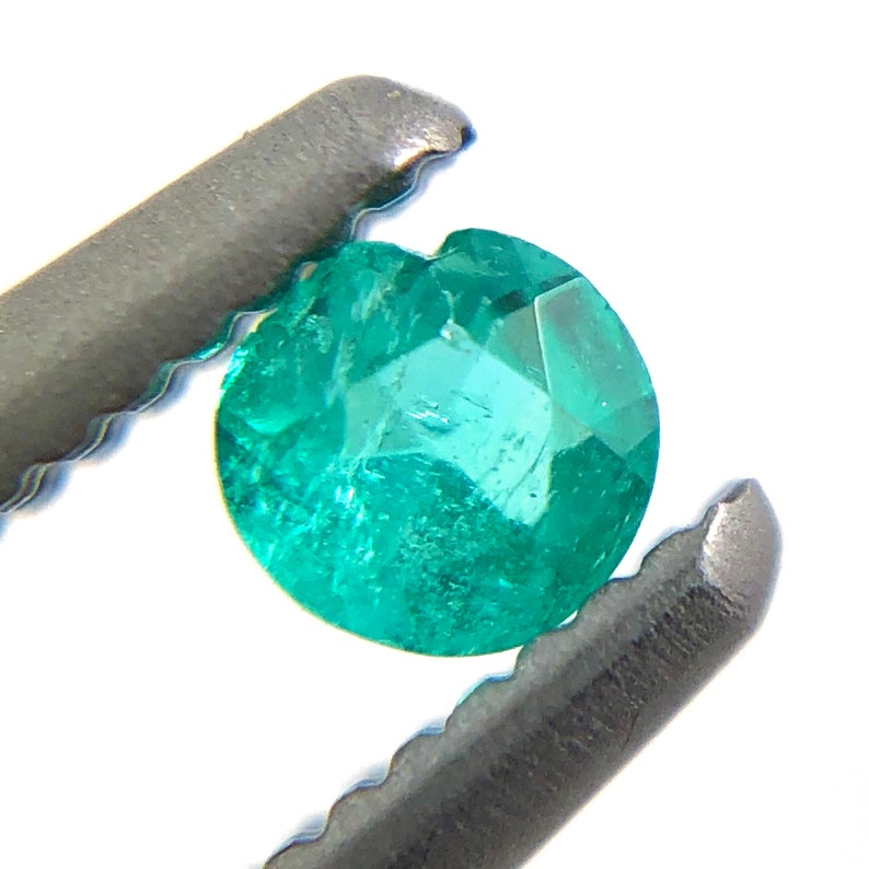 Paraiba tourmaline melee 0.08 carats 2.61x1.54mm round cut loose gemstone Buy loose or customise image 4