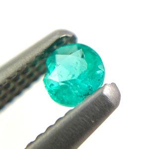 Paraiba tourmaline melee 0.08 carats 2.61x1.54mm round cut loose gemstone Buy loose or customise image 10