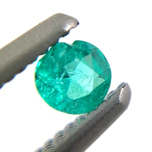 Paraiba tourmaline melee 0.08 carats 2.61x1.54mm round cut loose gemstone Buy loose or customise image 9