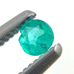 Paraiba tourmaline melee 0.08 carats 2.61x1.54mm round cut loose gemstone Buy loose or customise image 3