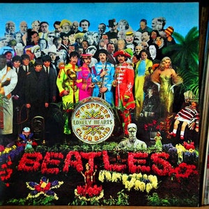 May include: A colourful album cover featuring a group of people in a psychedelic setting. The album cover is titled "Sgt. Pepper's Lonely Hearts Club Band" and features the band "The Beatles" in a collage of images. The album cover is surrounded by a floral border.