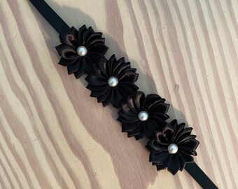 Black lotus flower with pearl centre