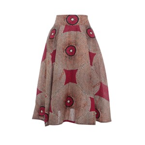 May include: A brown and red printed skirt with a circle pattern. The skirt has a high waist and a flared silhouette.