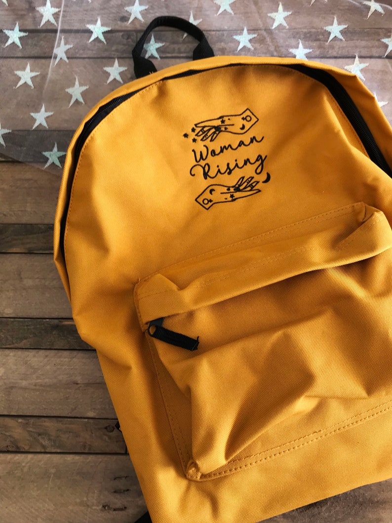 Mustard Woman Rising Backpack Magical Woman Empowered Merch Mama Changing Bag