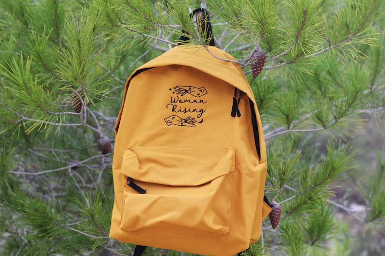 Mustard Woman Rising Backpack Magical Woman Empowered Merch Mama Changing Bag