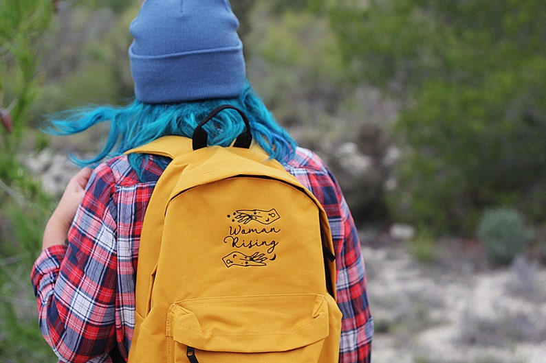Mustard Woman Rising Backpack Magical Woman Empowered Merch Mama Changing Bag