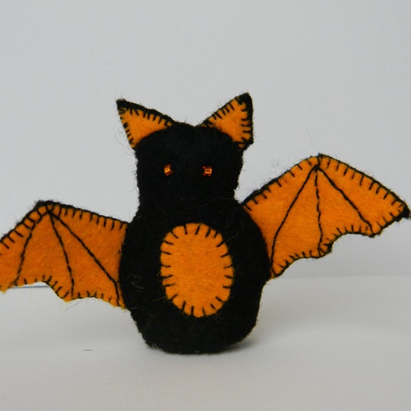 orange and black bat