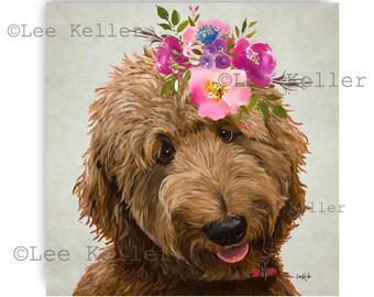 May include: A brown doodle dog wearing a flower crown with pink, purple, and blue flowers. The dog is looking at the camera with a happy expression.