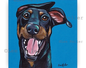 May include: A painting of a Doberman Pinscher dog with a black and brown coat. The dog is looking directly at the viewer with its tongue sticking out. The background is a bright blue color.